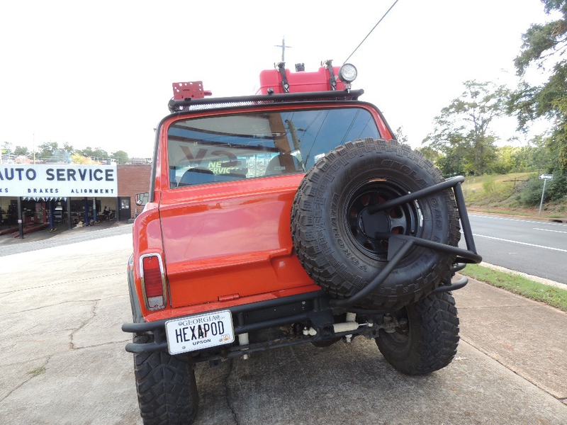 Illustration for article titled AT $18,000, Could This 6-Wheeled 1982 Jeep Cherokee Be The Ultimate Off Roader?